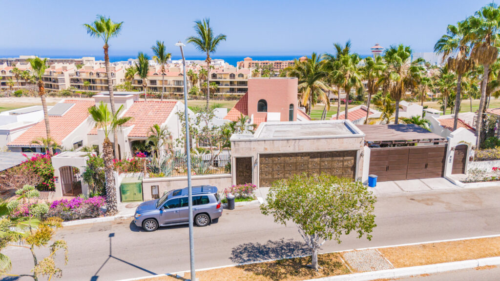 Los Cabos Brisas Del Pac East Rare opportunity to own a large Cabo property in a prime location close to the highway, shopping, hospitals, and schools. This unique compound offers multiple buildings with room for expansion and incredible rental income potential.The main home is an authentic Cabo-tyle house at the center of the property. A separate casita can easily be converted into two condos, ideal for generating rental income. The property also includes a large garage and workshop, with a flat buildable pad above the garage--perfect for another home or condos with stunning for sale