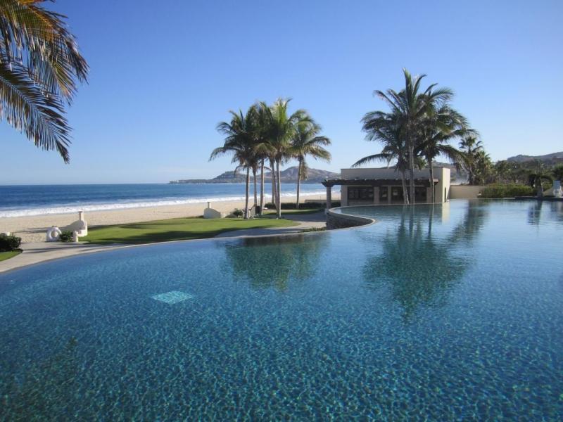 Los Cabos Brisas Del Pac East Rare opportunity to own a large Cabo property in a prime location close to the highway, shopping, hospitals, and schools. This unique compound offers multiple buildings with room for expansion and incredible rental income potential.The main home is an authentic Cabo-tyle house at the center of the property. A separate casita can easily be converted into two condos, ideal for generating rental income. The property also includes a large garage and workshop, with a flat buildable pad above the garage--perfect for another home or condos with stunning for sale