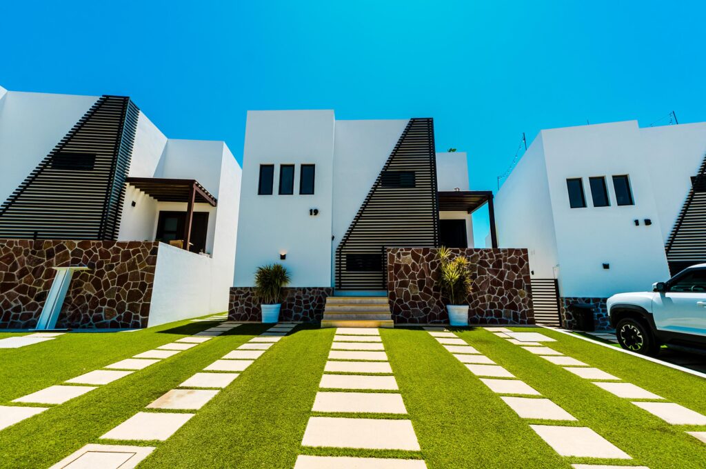Los Cabos Cumbre Del Tezal Move-in ready and fully furnished. 2,045 sq ft of construction on a 2,551 sq ft lot with 3-car parking. Luxury finishes include marble flooring, wood kitchen with granite countertops, built-in wooden closets in all bedrooms, and vanities with tempered glass shower doors in all 3.5 baths. Fully equipped with 5 Gree inverter mini-split A/C units (3 × 1-ton, 2 × 2-ton), LG 22' French Door refrigerator, Whirlpool gas stove, and 1.7 cu ft microwave hood. Additional features: rooftop with bar, grill & sink, private terrace, storage, WiFi smart lock, private 5,000-liter cistern, and termite prevention system. ommunity: pool, gym, sports courts, kids' area, 3 clubhouses & 24/7 gated security for sale