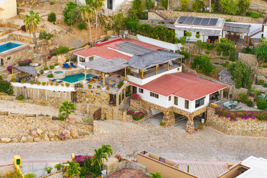 Los Cabos Pedregal Csl Villa Felicidad is a 5-bedroom, 5.5-bath residence in Pedregal that combines scale, location, and proven income potential. Set just minutes from the main gate and within walking distance to the marina, it offers effortless access to Cabo's best dining and nightlife while maintaining privacy. The home features a private pool, expansive terraces, and panoramic marina – 104 Los Valles, San Jose del Cabo, BS