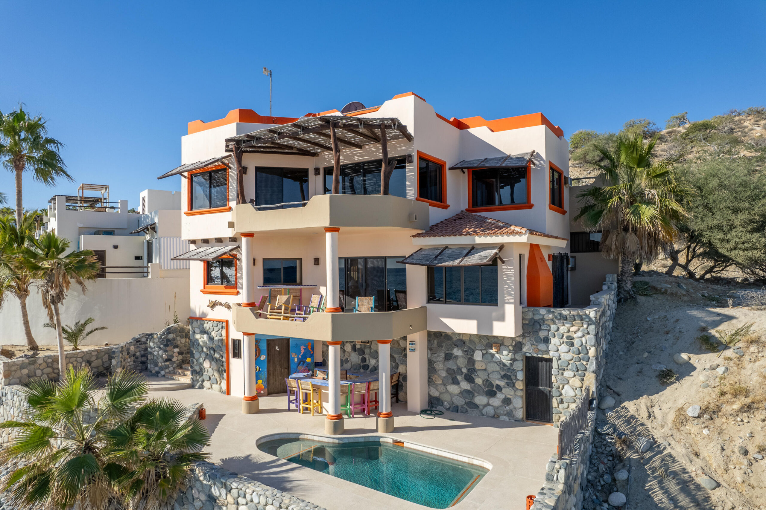 Los Cabos Pedregal Csl Villa Felicidad is a 5-bedroom, 5.5-bath residence in Pedregal that combines scale, location, and proven income potential. Set just minutes from the main gate and within walking distance to the marina, it offers effortless access to Cabo's best dining and nightlife while maintaining privacy. The home features a private pool, expansive terraces, and panoramic marina for sale