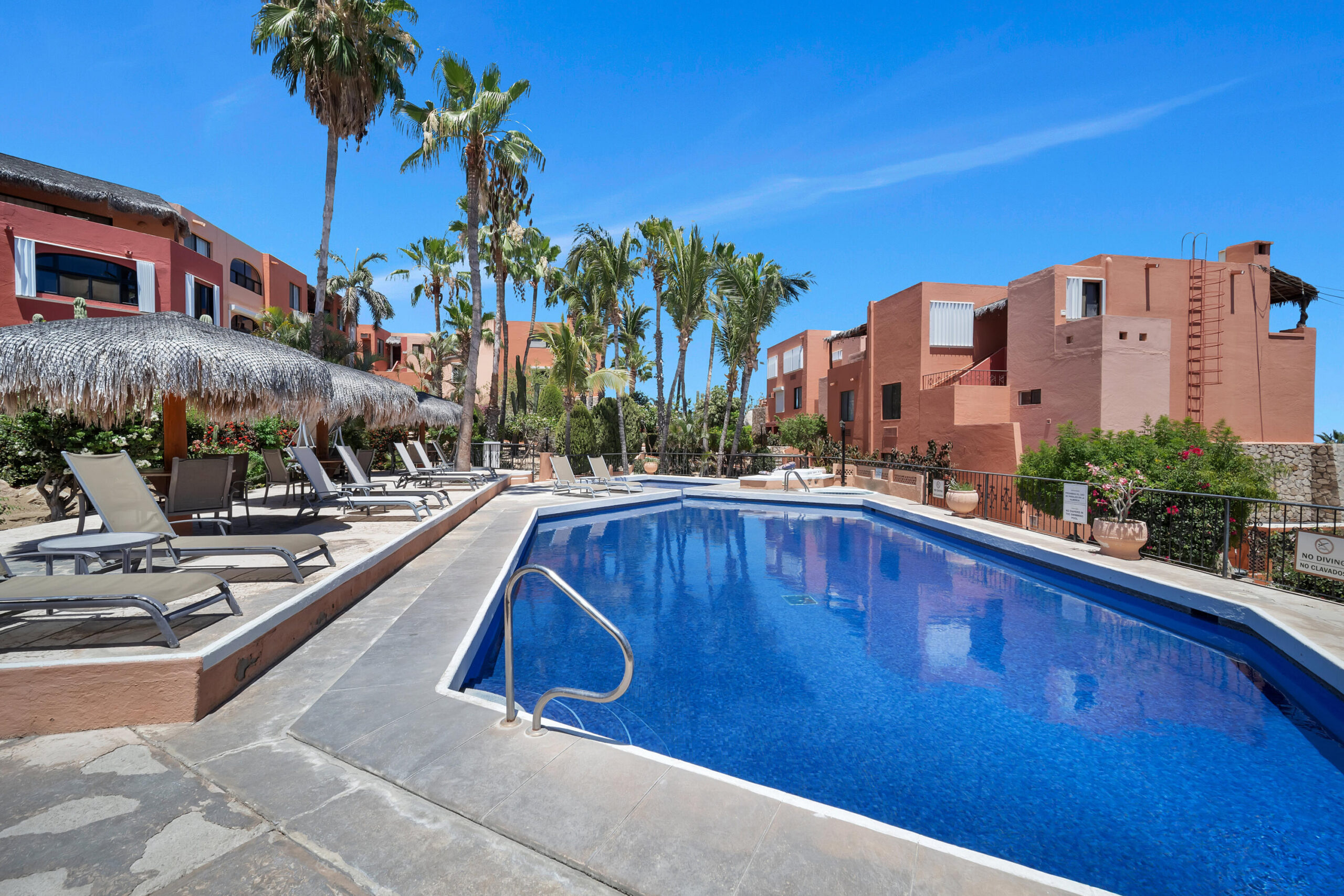 Los Cabos Tesoro Not all luxury condos are created equal. This extraordinary end-unit residence at Tesoro Resort stands apart as one of the most unique offerings in Cabo San Lucas.Boasting approximately 1,800 square feet of bright, open living space, this two-bedroom, two-bath condominium features an oversized primary suite, dedicated laundry area, and a spacious floor plan designed to capture the energy and beauty of the marina from nearly every angle.The true showpiece is the spectacular palapa-covered terrace--one of the largest private outdoor living spaces in the marina. Complete with a custom Jacuzzi, this incredible outdoor retreat functions as a second living room, dining area, and entertainment space all in one. From sunrise to sunset, enjoy commanding – Plaza Calafia, Cabo Corridor, Cabo Corridor, BS
